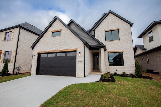 4708 Fieldcrest Ter, Rogers, AR 72758 - view of front of house with brick siding, concrete driveway, a front yard, and a garage
