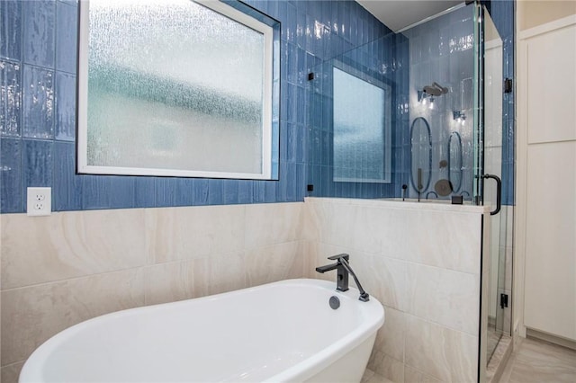 4708 Fieldcrest Ter, Rogers, AR 72758 - full bath with a stall shower and a freestanding bath