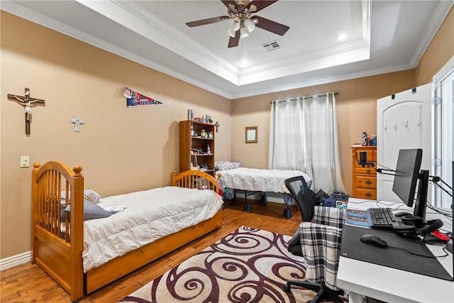 17444 16th Hwy, Siloam Springs, AR 72761 - bedroom featuring wood finished floors, ornamental molding, a raised ceiling, a desk, and baseboards