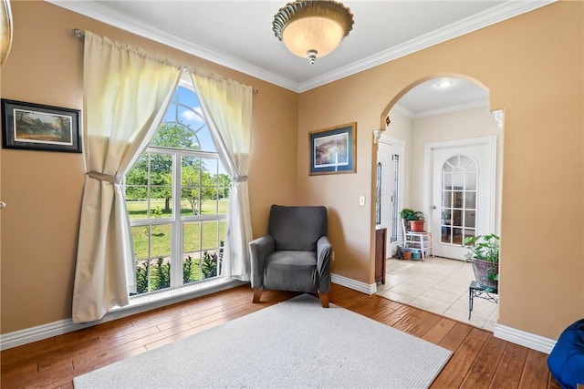 17444 16th Hwy, Siloam Springs, AR 72761 - living area with hardwood / wood-style floors, arched walkways, baseboards, and ornamental molding