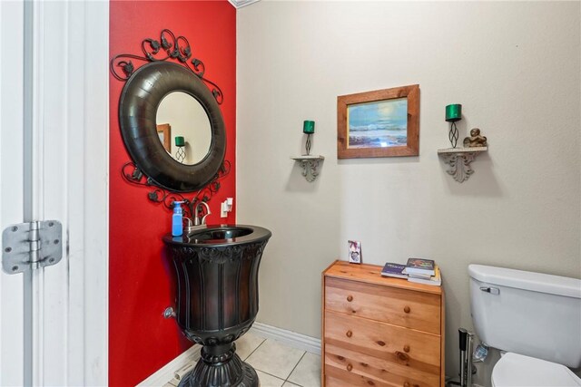 17444 16th Hwy, Siloam Springs, AR 72761 - bathroom featuring tile patterned flooring, toilet, and a sink