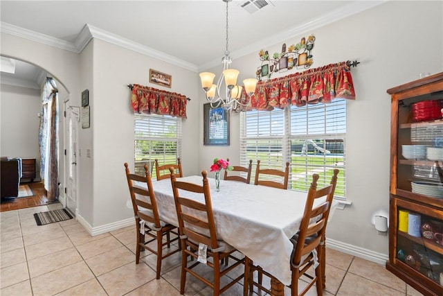 17444 16th Hwy, Siloam Springs, AR 72761 - dining room featuring light tile patterned flooring, arched walkways, ornamental molding, a chandelier, and baseboards