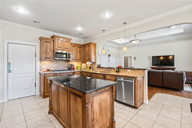 17444 16th Hwy, Siloam Springs, AR 72761 - kitchen featuring appliances with stainless steel finishes, a sink, light tile patterned floors, open floor plan, and a peninsula