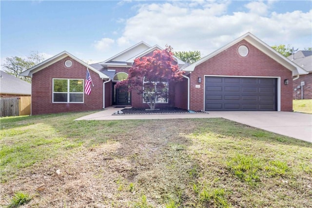 ranch-style house featuring a front lawn, driveway, fence, a garage, and brick siding