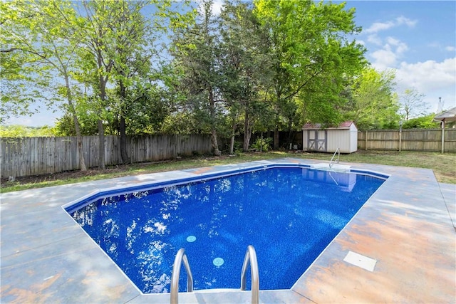 view of pool with a fenced in pool, a fenced backyard, a storage shed, an outdoor structure, and a patio