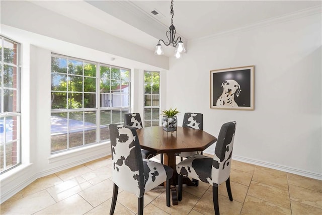 dining area with a notable chandelier, baseboards, ornamental molding, and visible vents
