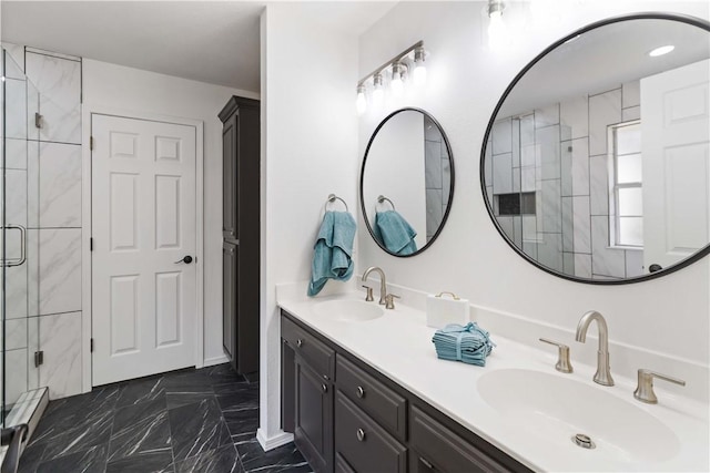 bathroom featuring a baseboard radiator, a shower stall, and a sink