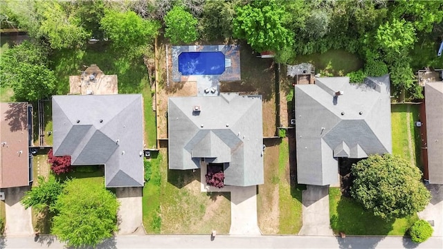 birds eye view of property with a residential view