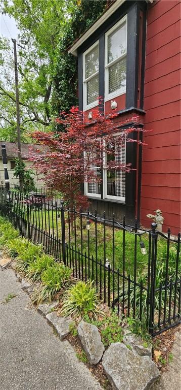 view of front of property with fence