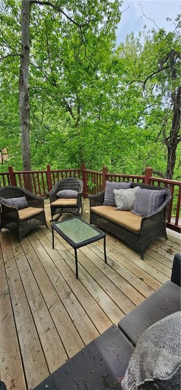 wooden deck with outdoor lounge area