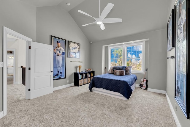 bedroom with baseboards, carpet, a ceiling fan, and high vaulted ceiling
