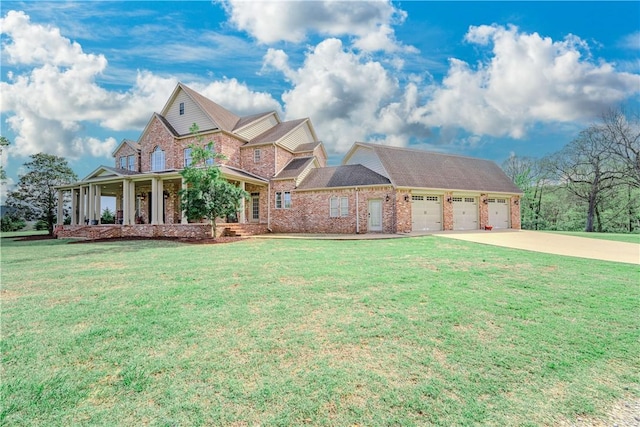 craftsman-style house with brick siding, a front yard, and a garage