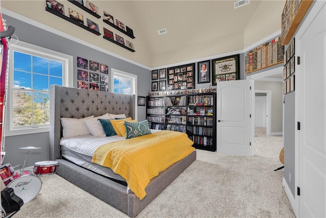 carpeted bedroom featuring baseboards, a towering ceiling, and visible vents