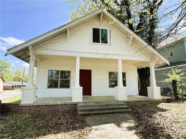 back of house with covered porch