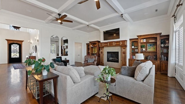 5309 S Promontory Ct, Rogers, AR 72758 - living area with ceiling fan, coffered ceiling, beam ceiling, dark wood finished floors, and crown molding