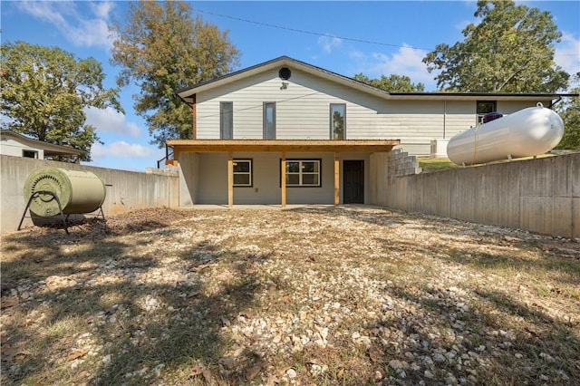 back of property with fence