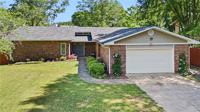 ranch-style house with a front lawn, brick siding, driveway, and a garage