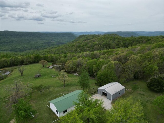 bird's eye view featuring a forest view