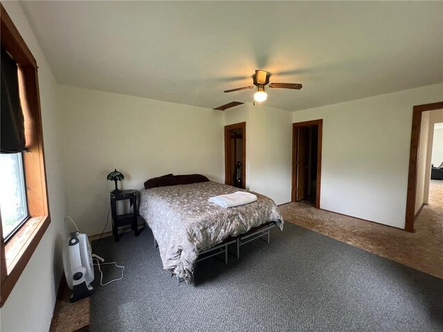 bedroom with carpet and a ceiling fan