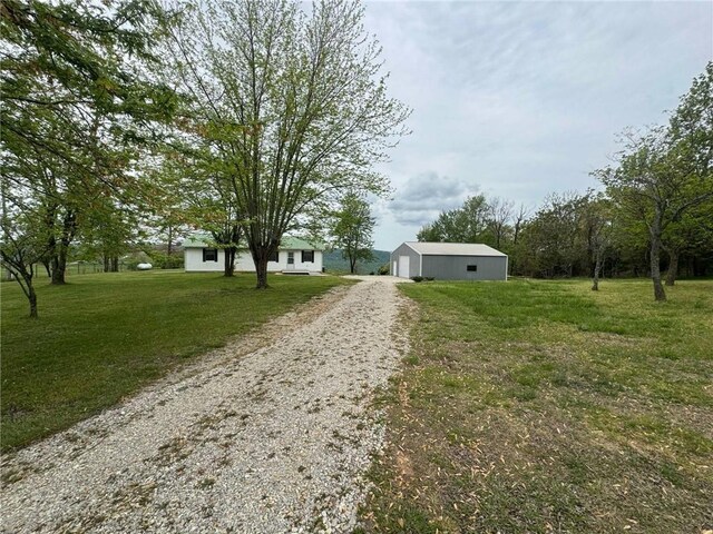 view of road featuring driveway