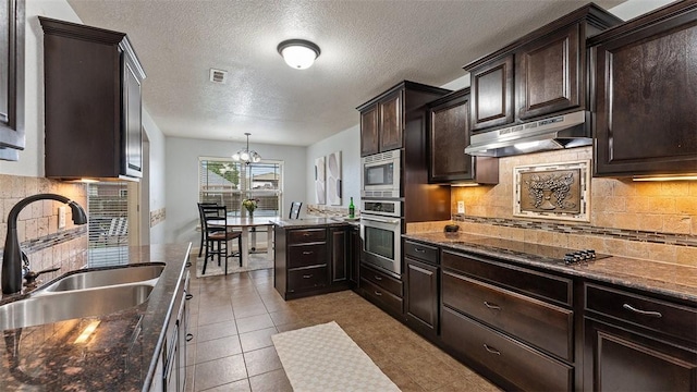 505 Blair Cir, Pea Ridge, AR 72751 - kitchen featuring an inviting chandelier, a sink, stainless steel appliances, backsplash, and under cabinet range hood