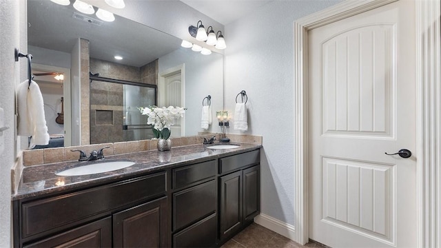 505 Blair Cir, Pea Ridge, AR 72751 - bathroom featuring a sink, tile patterned floors, a stall shower, and double vanity