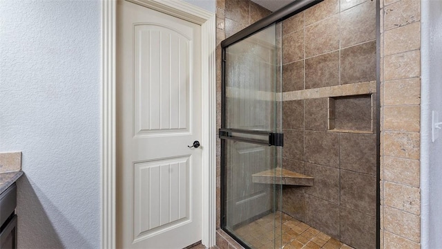 505 Blair Cir, Pea Ridge, AR 72751 - bathroom featuring a shower stall and vanity