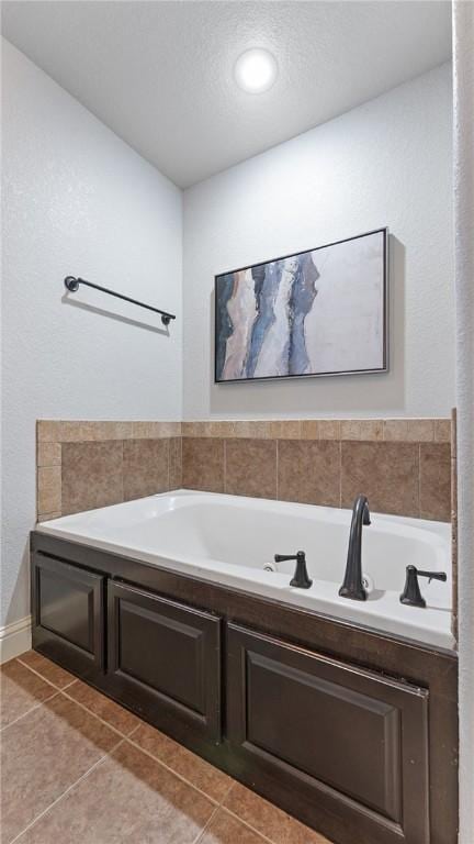 505 Blair Cir, Pea Ridge, AR 72751 - bathroom with tile patterned flooring and a garden tub