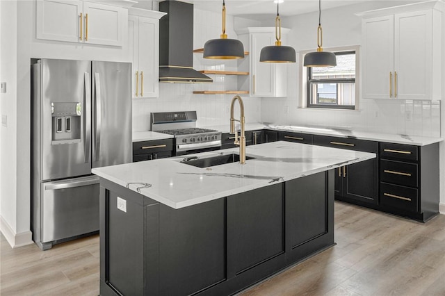 220 N C St, Rogers, AR 72756 - kitchen with stainless steel appliances, a sink, light wood finished floors, wall chimney range hood, and white cabinets