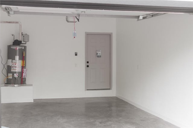 220 N C St, Rogers, AR 72756 - garage with water heater and a garage door opener