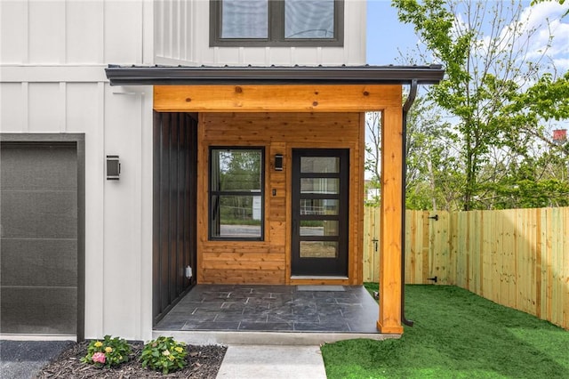 220 N C St, Rogers, AR 72756 - property entrance with board and batten siding