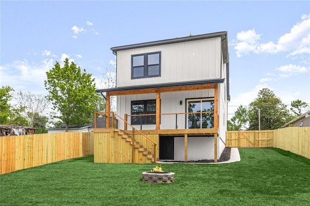 220 N C St, Rogers, AR 72756 - back of house featuring a fire pit and stairs