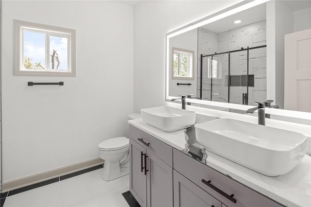 220 N C St, Rogers, AR 72756 - full bath featuring double vanity, a marble finish shower, toilet, and baseboards