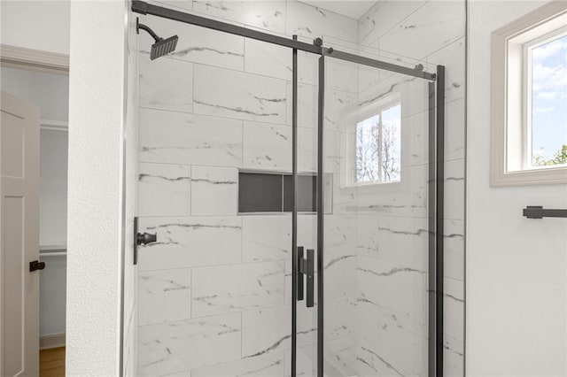 220 N C St, Rogers, AR 72756 - bathroom featuring a marble finish shower
