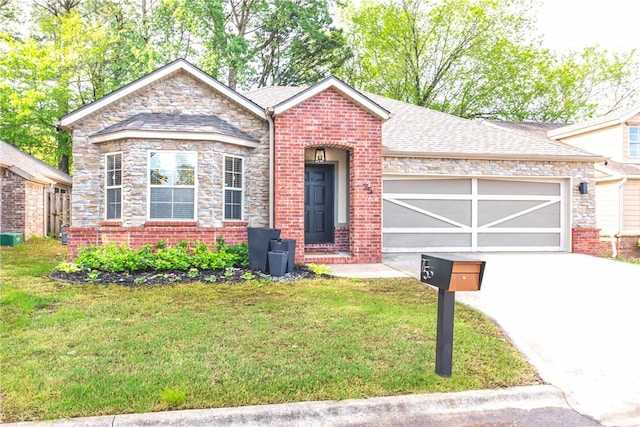75 E Madrid St, Fayetteville, AR 72703 - ranch-style house with driveway, an attached garage, a front yard, brick siding, and roof with shingles