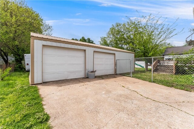 detached garage with fence