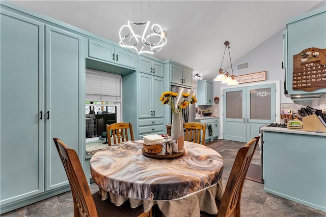 3531 Wagner Rd, Fayetteville, AR 72704 - dining space featuring a chandelier and vaulted ceiling
