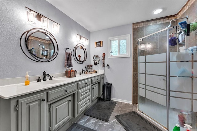 3531 Wagner Rd, Fayetteville, AR 72704 - bathroom with double vanity, a stall shower, and baseboards