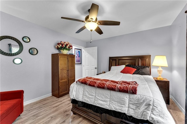 3531 Wagner Rd, Fayetteville, AR 72704 - bedroom with light wood-style floors, baseboards, and ceiling fan