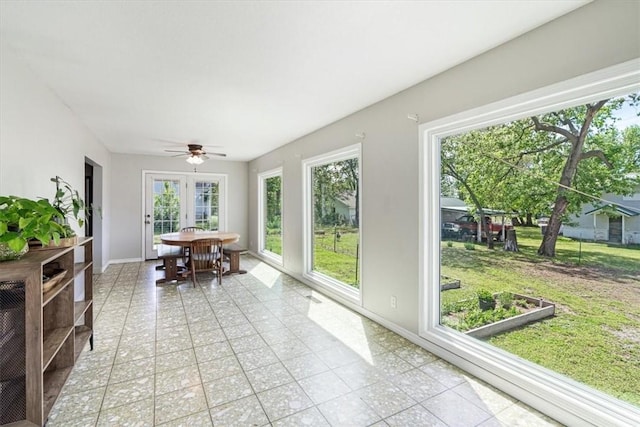 501 SE Main St, Gravette, AR 72736 - sunroom featuring baseboards