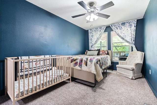 501 SE Main St, Gravette, AR 72736 - carpeted bedroom with ceiling fan