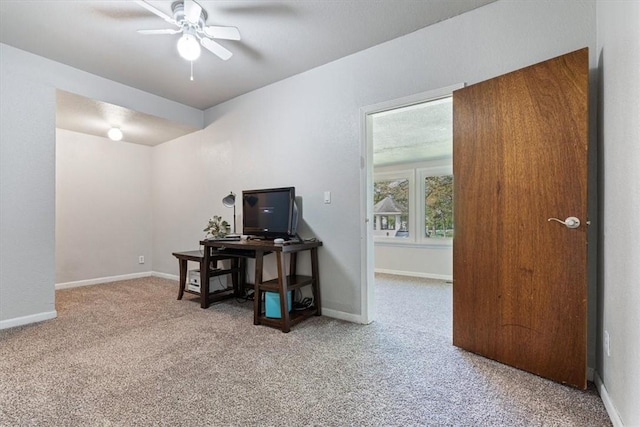 501 SE Main St, Gravette, AR 72736 - interior space with carpet flooring, baseboards, and ceiling fan