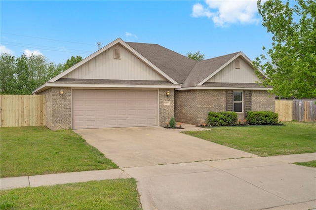 ranch-style home featuring fence, brick siding, a garage, a front yard, and driveway