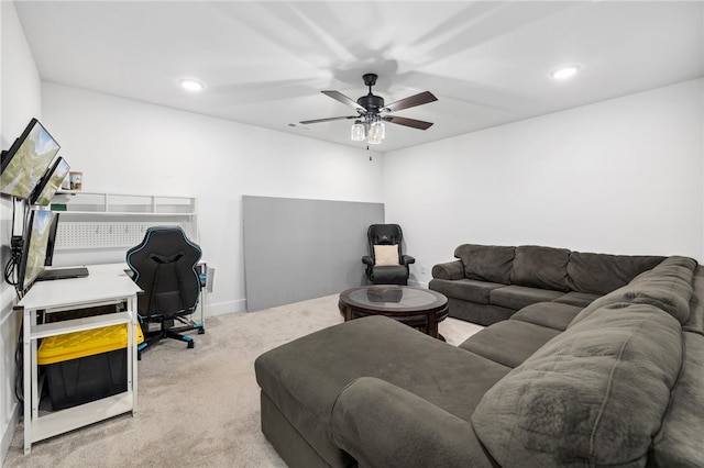 carpeted living area featuring recessed lighting and a ceiling fan