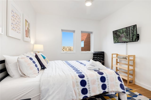 502 SE Tourmaline Mews, Bentonville, AR 72712 - bedroom with wood finished floors and baseboards