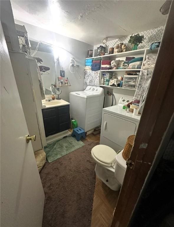 bathroom with toilet and vanity