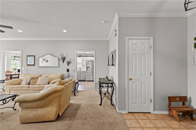 424 W Tanner Dr, Fayetteville, AR 72701 - living room featuring light tile patterned floors, crown molding, a ceiling fan, and recessed lighting