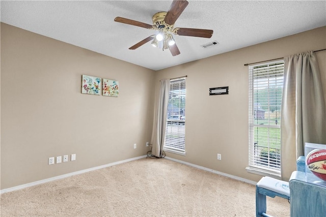 424 W Tanner Dr, Fayetteville, AR 72701 - unfurnished room with carpet flooring, visible vents, ceiling fan, and baseboards