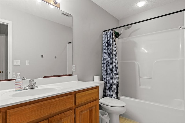 424 W Tanner Dr, Fayetteville, AR 72701 - full bathroom featuring a textured ceiling, visible vents, toilet, shower / bath combination with curtain, and vanity