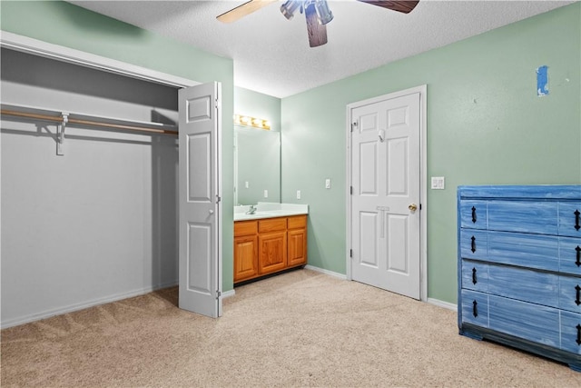 424 W Tanner Dr, Fayetteville, AR 72701 - unfurnished bedroom featuring a sink, ceiling fan, light colored carpet, and baseboards